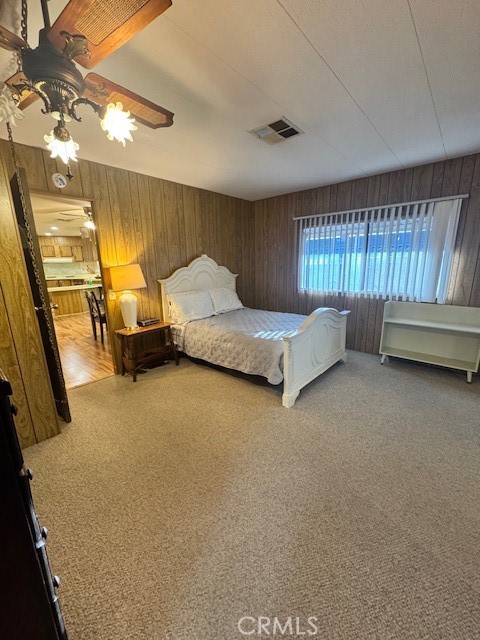 975 California Street, Unit 8 Calimesa, CA 92320 - Photo 12 of 19 a spacious bedroom with a bed and a couch