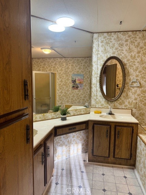 975 California Street, Unit 8 Calimesa, CA 92320 - Photo 15 of 19 a bathroom with a sink and a mirror