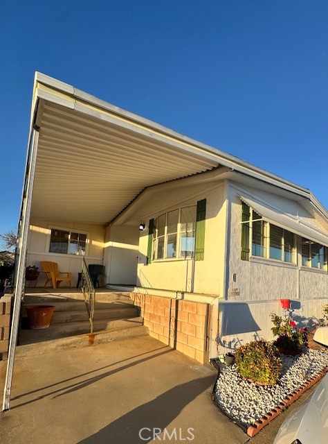 975 California Street, Unit 8 Calimesa, CA 92320 - Photo 3 of 19 a house view with a outdoor space