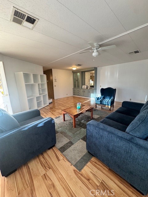 975 California Street, Unit 8 Calimesa, CA 92320 - Photo 5 of 19 a bedroom with furniture and a fireplace