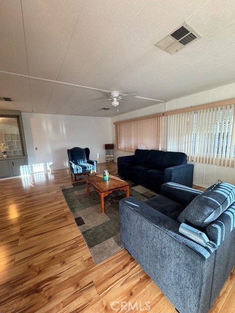 975 California Street, Unit 8 Calimesa, CA 92320 - Photo 6 of 19 a living room with furniture and a rug