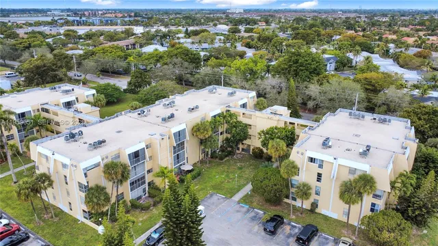 an aerial view of a house with a garden