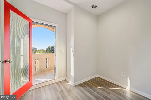 a view of an empty room and window