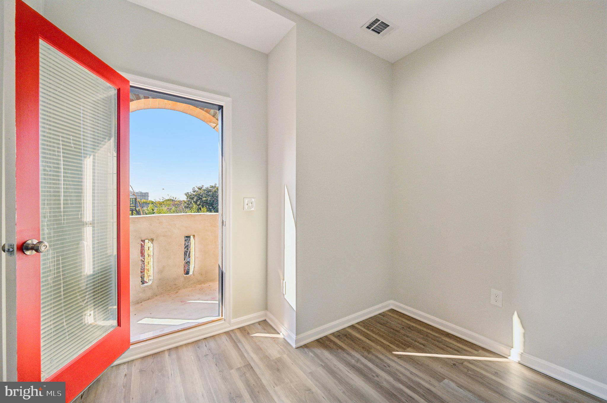 750 Reservoir Street, Unit C Baltimore, MD 21217 - Photo 14 of 25 a view of an empty room and window