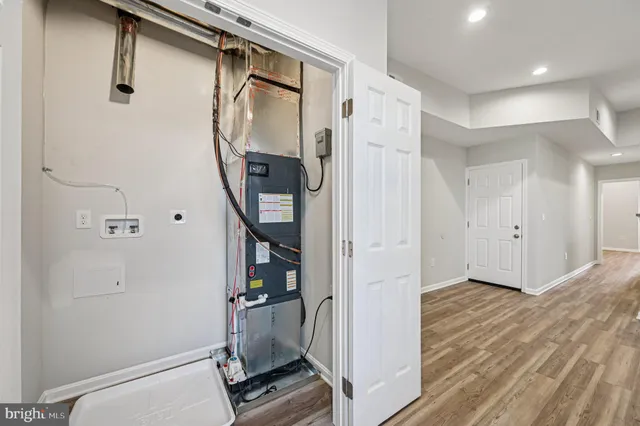 a view of entryway with wooden floor