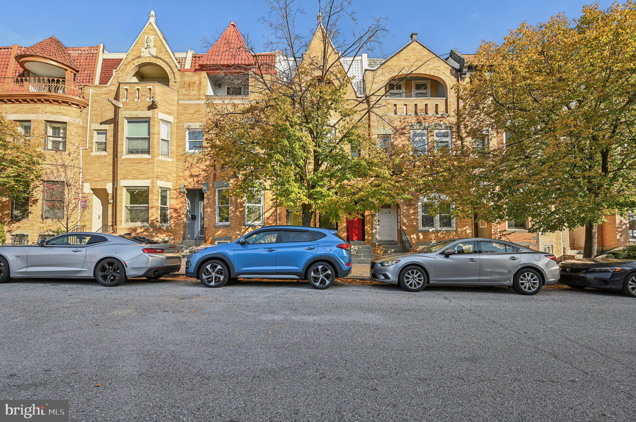 750 Reservoir Street, Unit C Baltimore, MD 21217 - Photo 3 of 25 a view of cars parked in front of a building