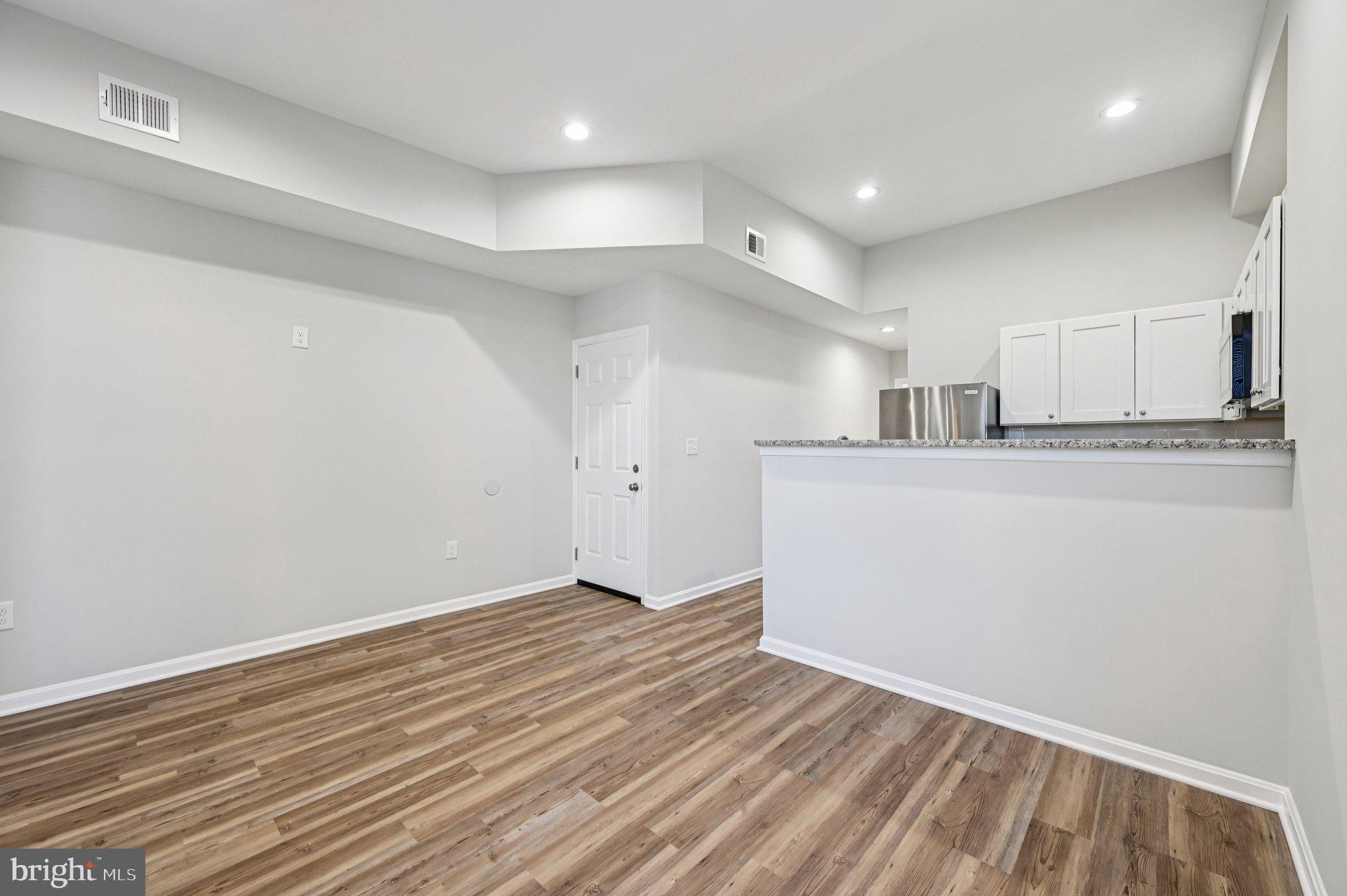 750 Reservoir Street, Unit C Baltimore, MD 21217 - Photo 9 of 25 a view of a kitchen with electric appliances