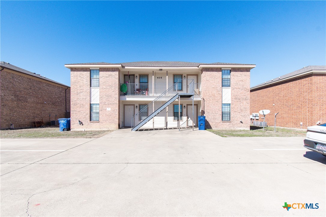 405 Bermuda Street, Unit B Copperas Cove, TX 76522 - Photo 1 of 13 a view of a house with wooden floor and sitting area