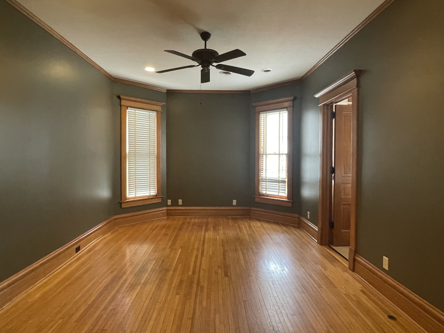 322 Crawford Avenue Dixon, IL 61021 - Photo 16 of 44 a view of empty room with wooden floor and fan