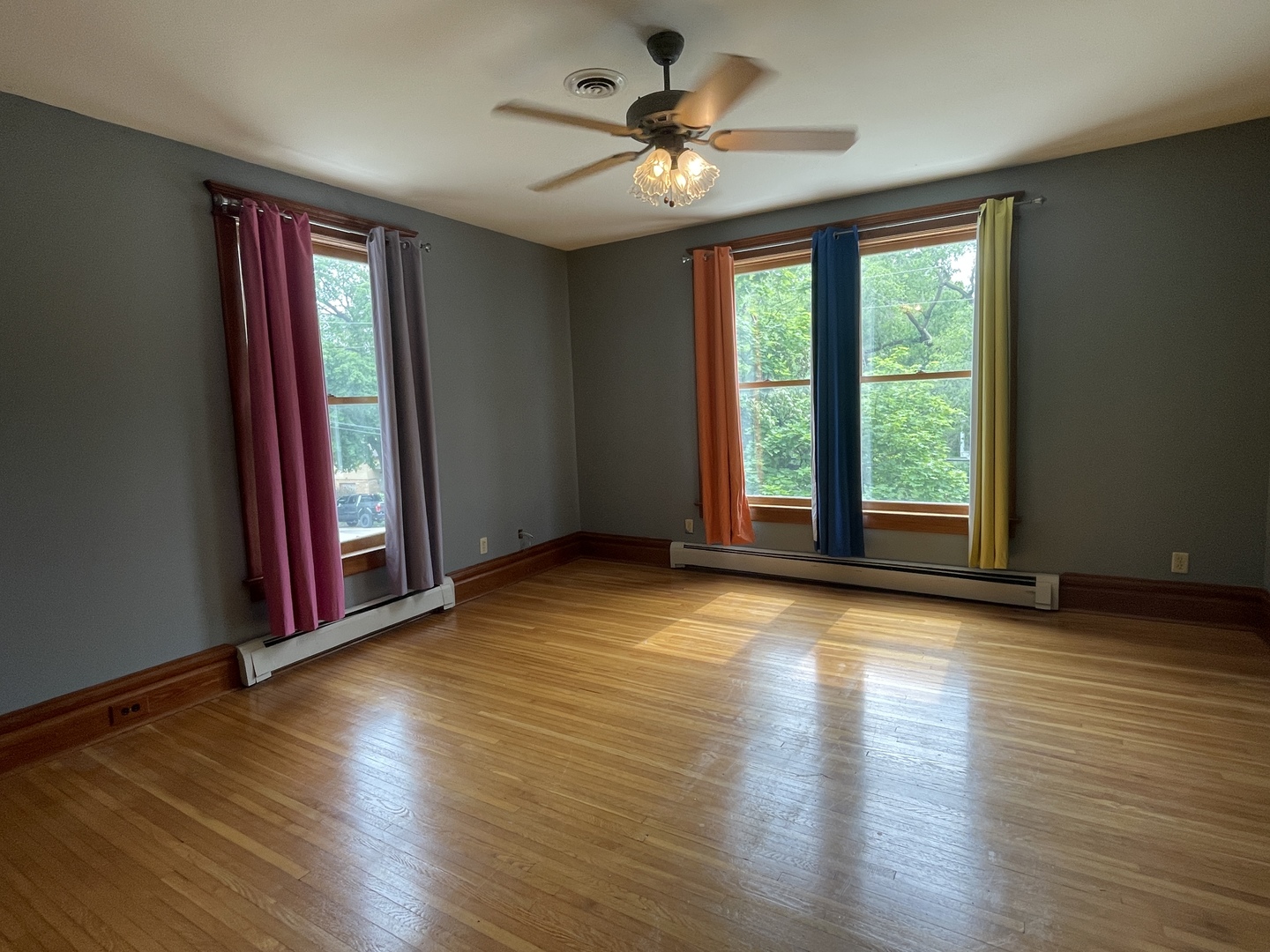 322 Crawford Avenue Dixon, IL 61021 - Photo 31 of 44 a view of an empty room with wooden floor and a window