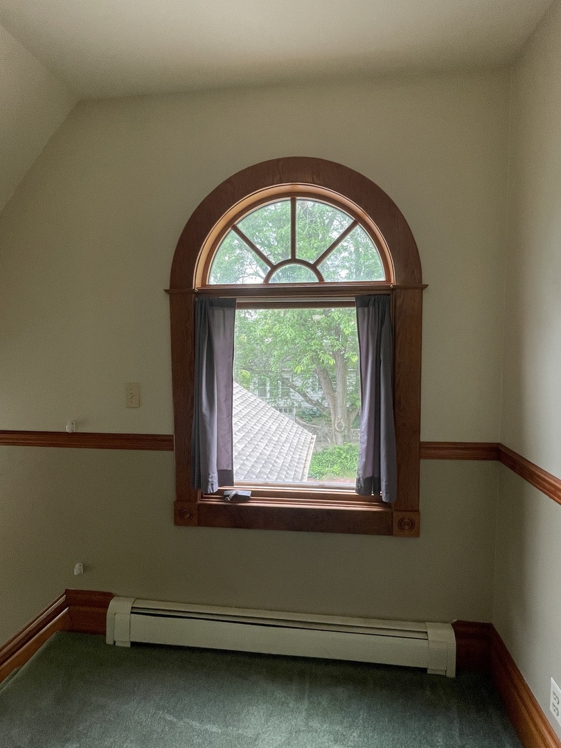 322 Crawford Avenue Dixon, IL 61021 - Photo 36 of 44 a room with a window and a mirror
