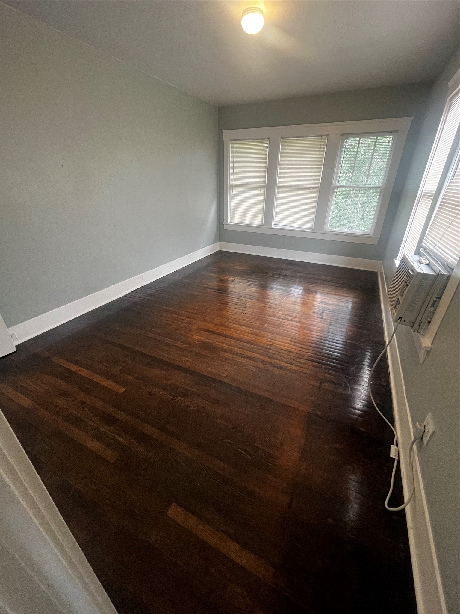 1711 West Main Street, Unit 3 Houston, TX 77098 - Photo 2 of 11 wooden floor in an empty room