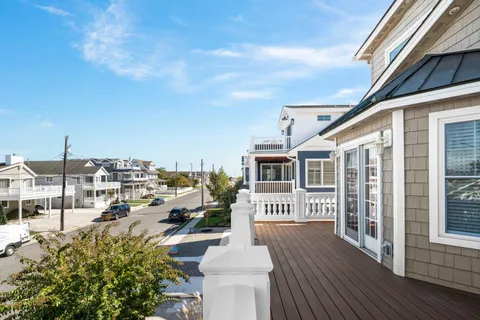 a living room with fireplace furniture and a flat screen tv