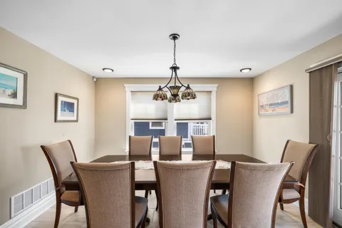 a view of a chairs on the roof deck