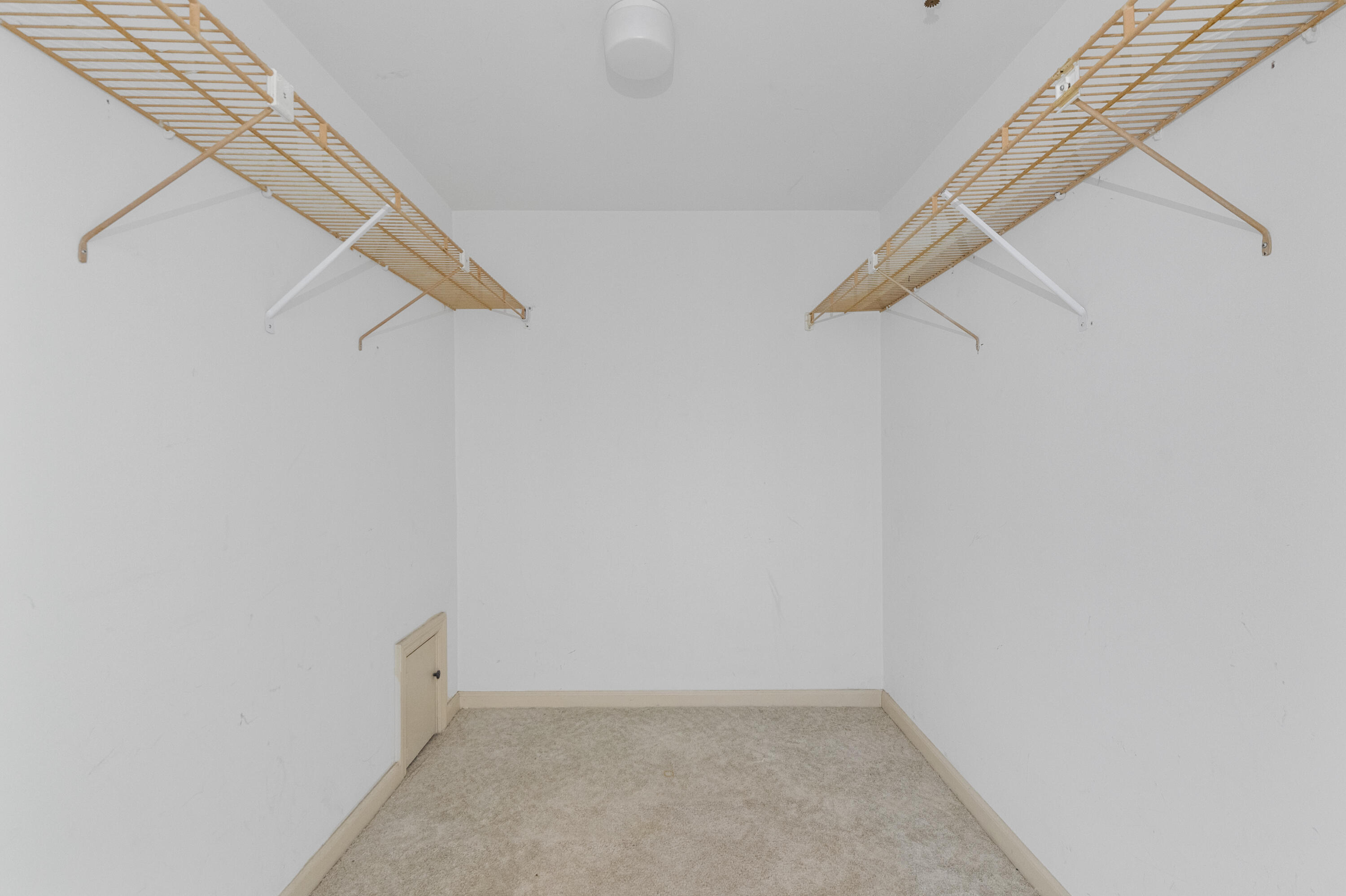 859 Jeffery Street, Unit 312 Boca Raton, FL 33487 - Photo 21 of 53 a view of small space with racks on the wall