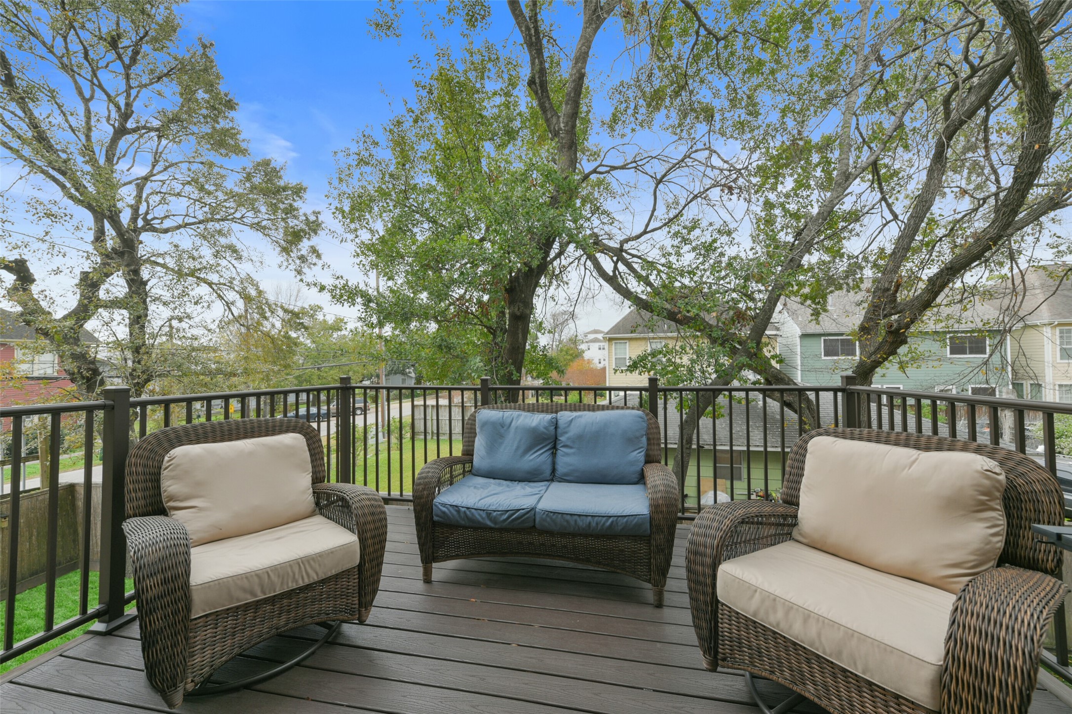 2601 Bevis Street, Unit B Houston, TX 77008 - Photo 11 of 25 Step outside to the kitchen to this extended second-floor patio, offering a great space for grilling, outdoor meals, and entertaining—just off the kitchen for ultimate convenience.