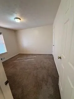 en empty room with windows