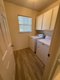 a view of a hallway with stairs