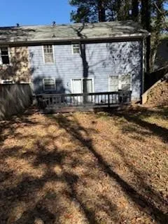 a view of balcony with wooden floor