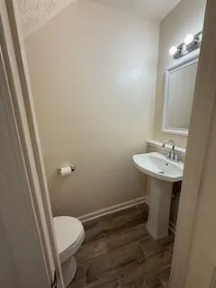 a bathroom with sink and mirror