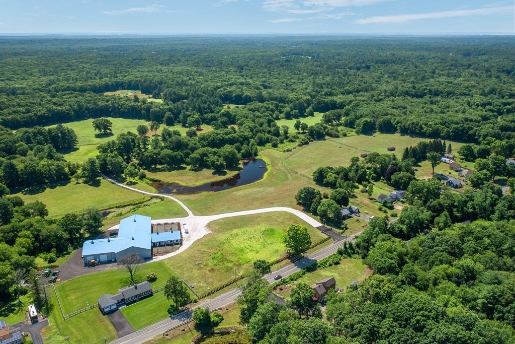 an aerial view of a house with a garden