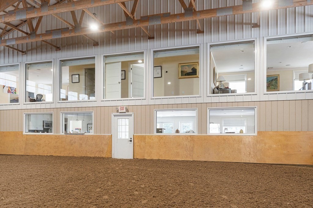 23 Bay State Road Rehoboth, MA 02769 - Photo 11 of 42 a view of a kitchen with a fridge and wooden floor
