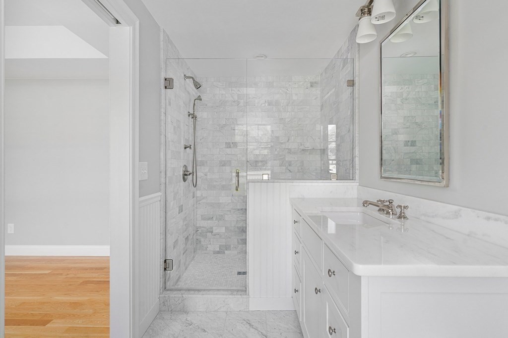 23 Bay State Road Rehoboth, MA 02769 - Photo 24 of 42 a bathroom with a shower sink and mirror