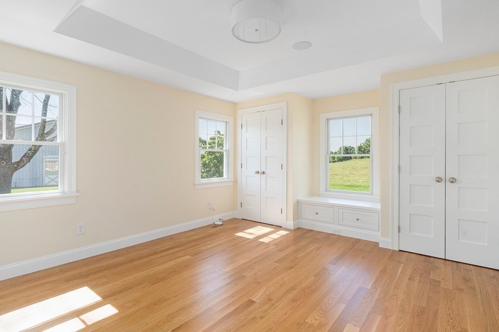23 Bay State Road Rehoboth, MA 02769 - Photo 25 of 42 wooden floor in an empty room with a window