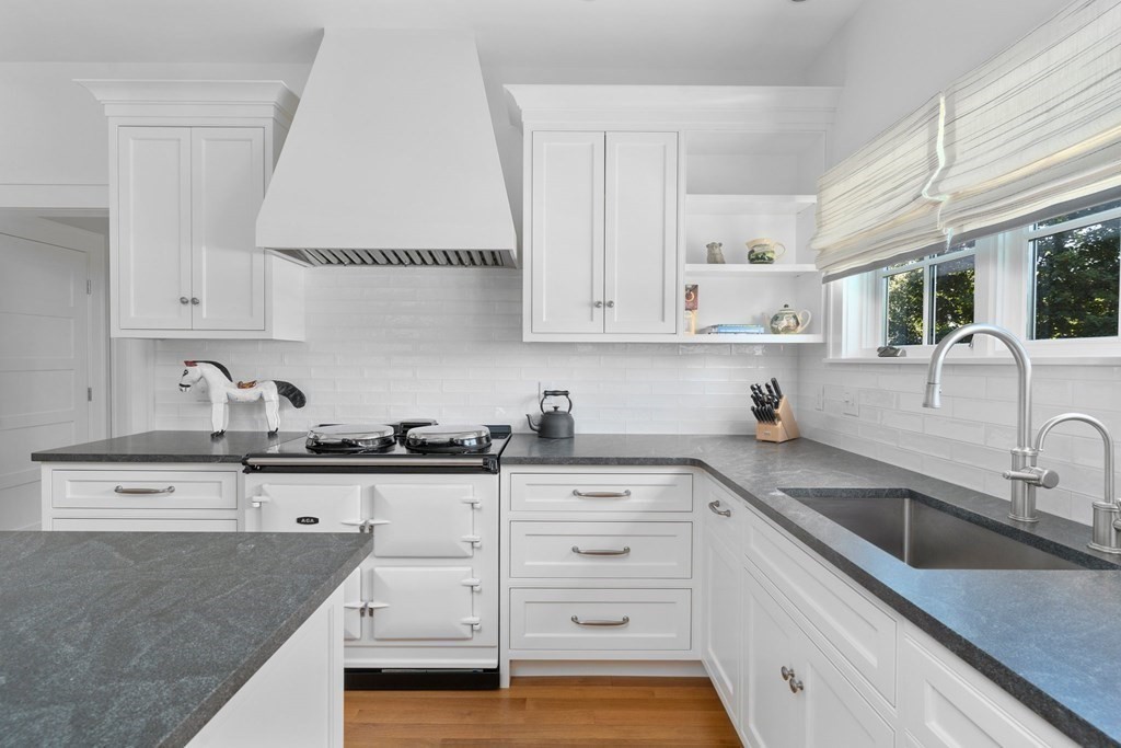 23 Bay State Road Rehoboth, MA 02769 - Photo 30 of 42 a kitchen with granite countertop white cabinets and white appliances