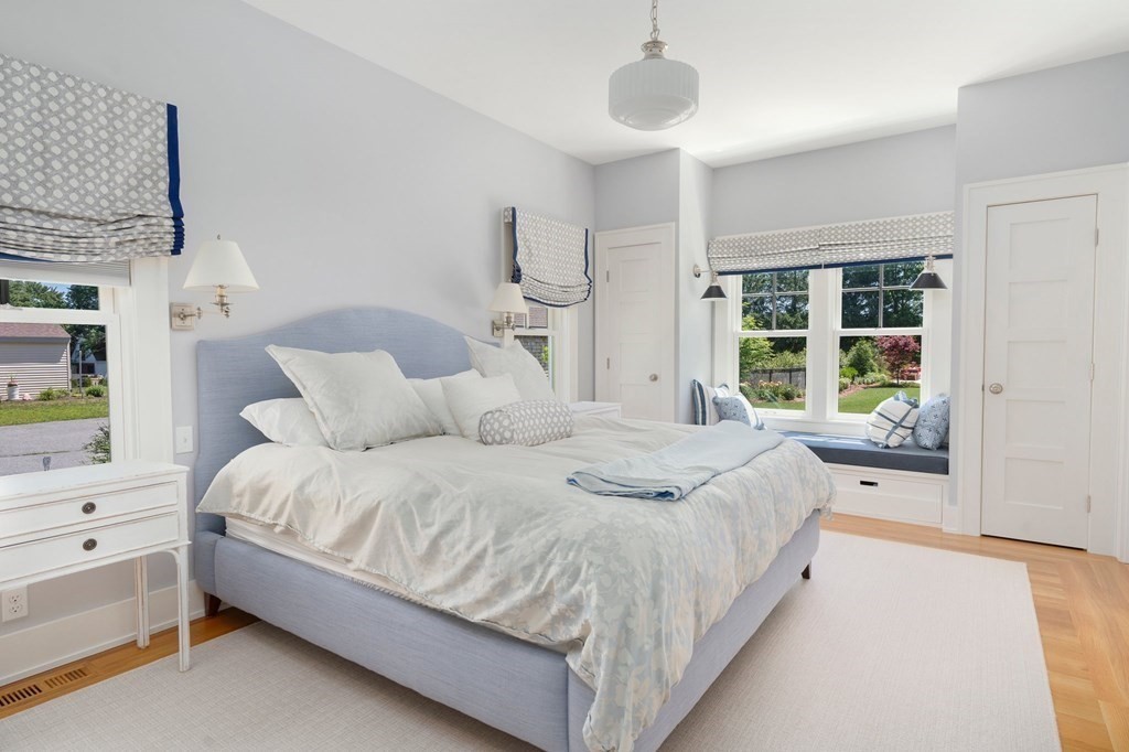 23 Bay State Road Rehoboth, MA 02769 - Photo 34 of 42 a large bed sitting in a bedroom next to a window with a dresser