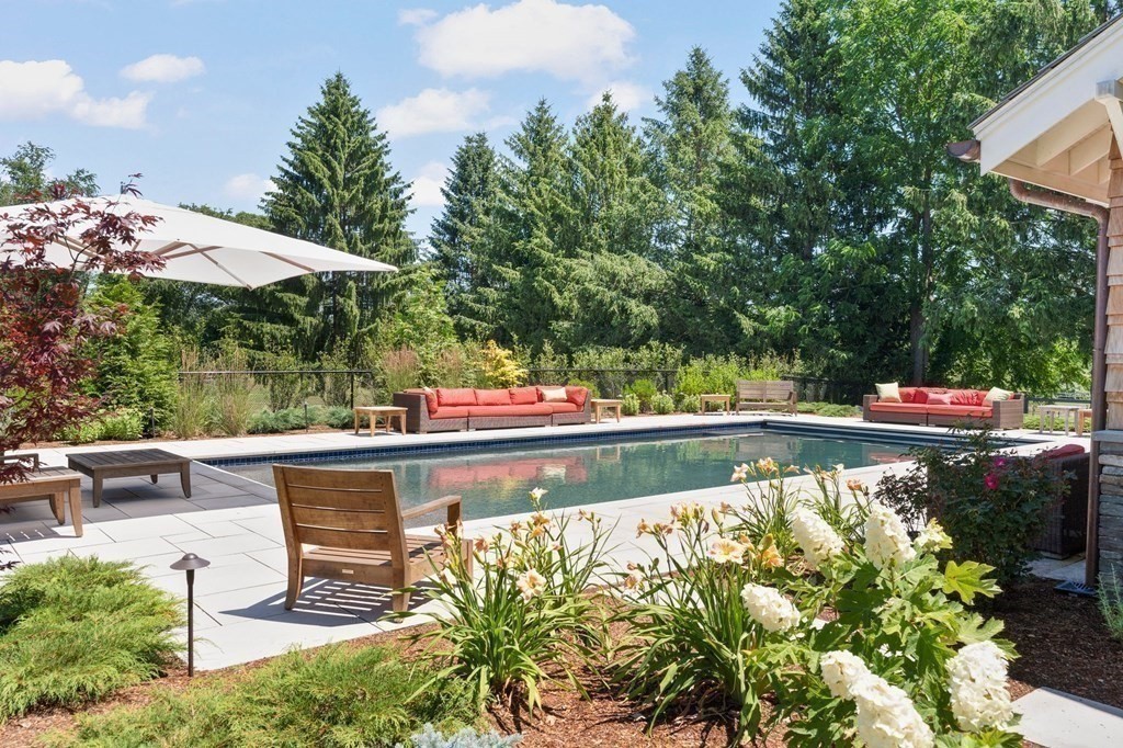 23 Bay State Road Rehoboth, MA 02769 - Photo 40 of 42 a view of a swimming pool with a patio and fire pit
