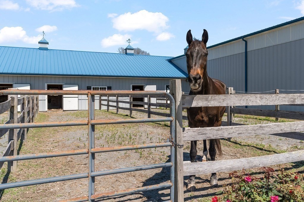 23 Bay State Road Rehoboth, MA 02769 - Photo 8 of 42 a kitchen with stainless steel appliances kitchen island granite countertop a stove and cabinets