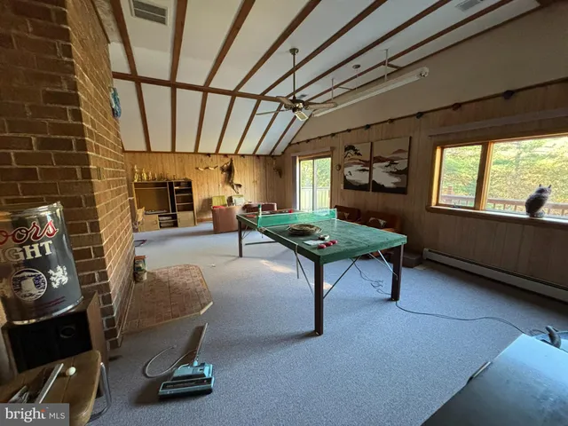 a bathroom with a shower curtain and a sink
