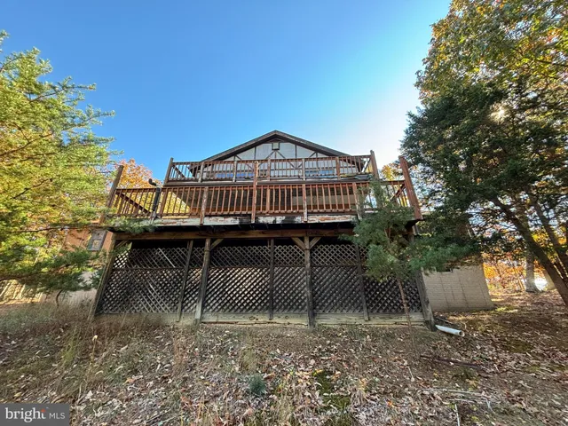 a view of a house with a roof deck