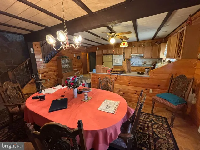 a view of a dining room with furniture