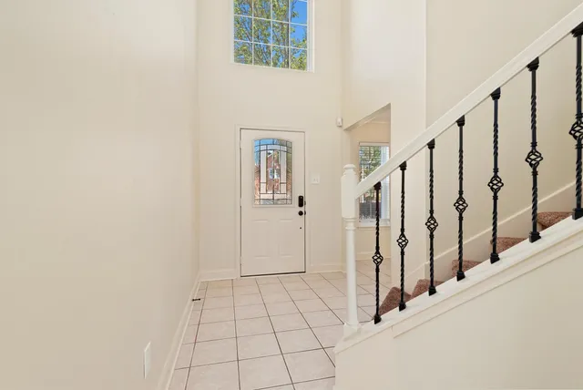 a view of an entryway with staircase