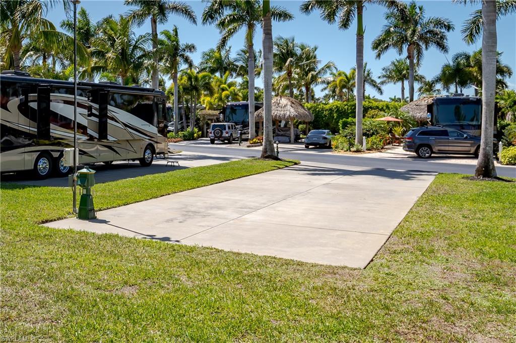 13594 Snapper Lane Naples, FL 34114 - Photo 22 of 29 a view of a park with palm trees