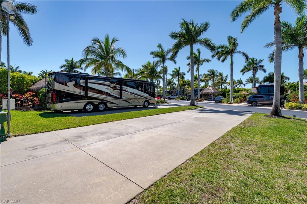 13594 Snapper Lane Naples, FL 34114 - Photo 23 of 29 a view of a park with palm trees