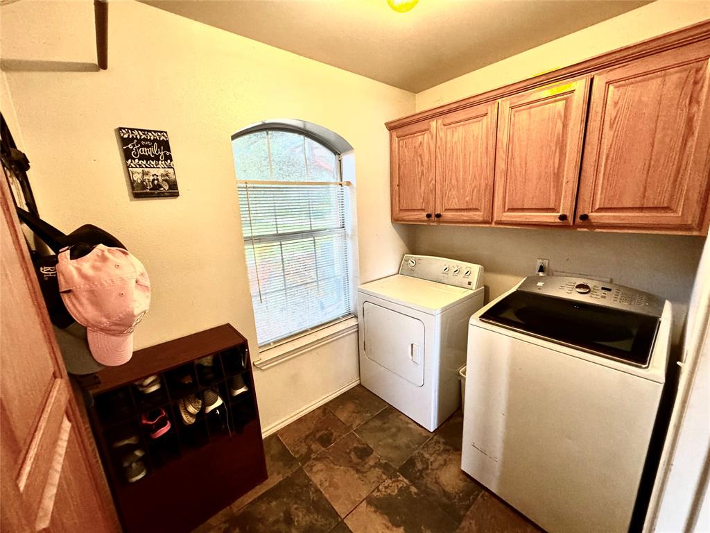 505 3rd Street Dodd City, TX 75438 - Photo 25 of 37 a utility room with dryer and washer