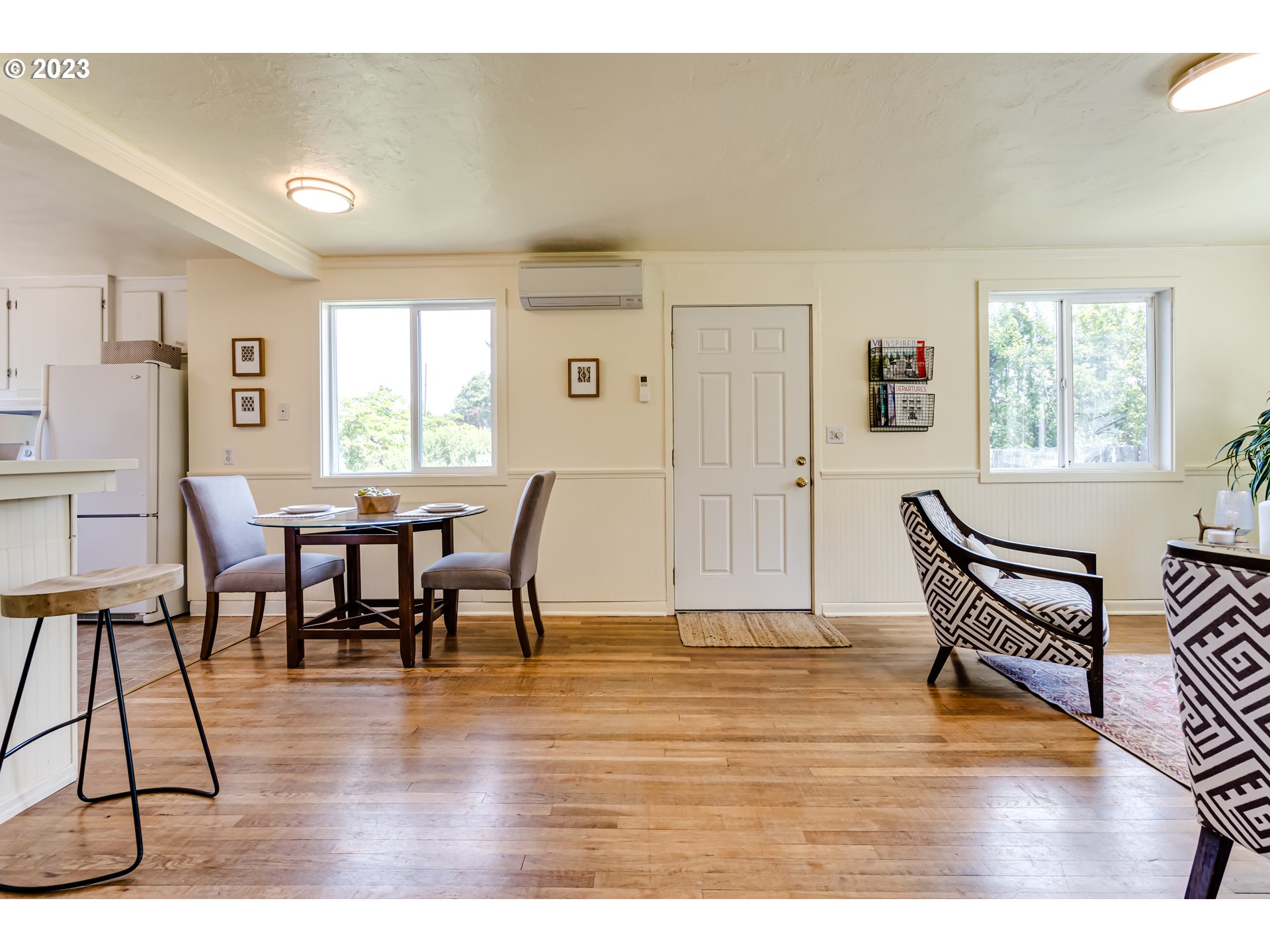 618 19th Street Springfield, OR 97477 - Photo 5 of 6 a view of a dining room with furniture and wooden floor