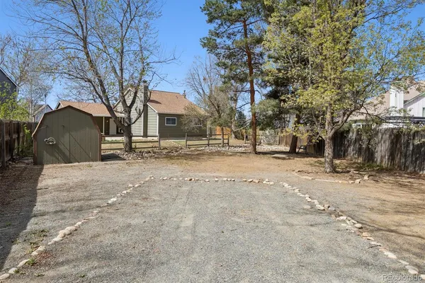 a house with trees in front of it