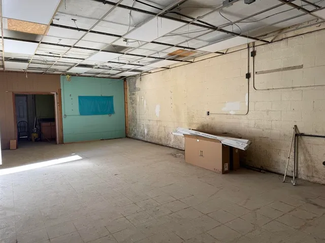 a view of a room with a garage