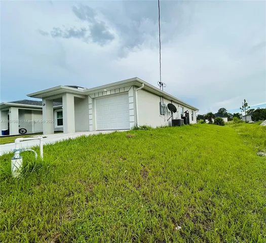 a house view with a garden space
