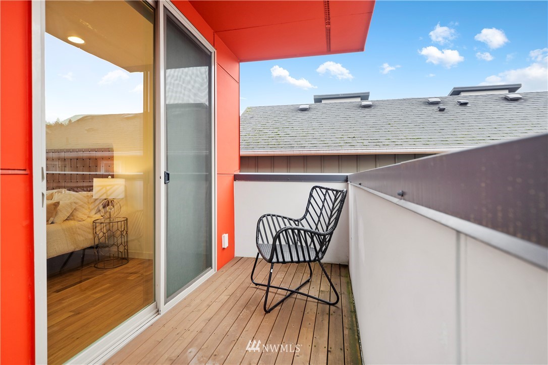 3932 South Brandon Street, Unit B Seattle, WA 98118 - Photo 25 of 29 a outdoor space with granite countertop a couch and a view of living room