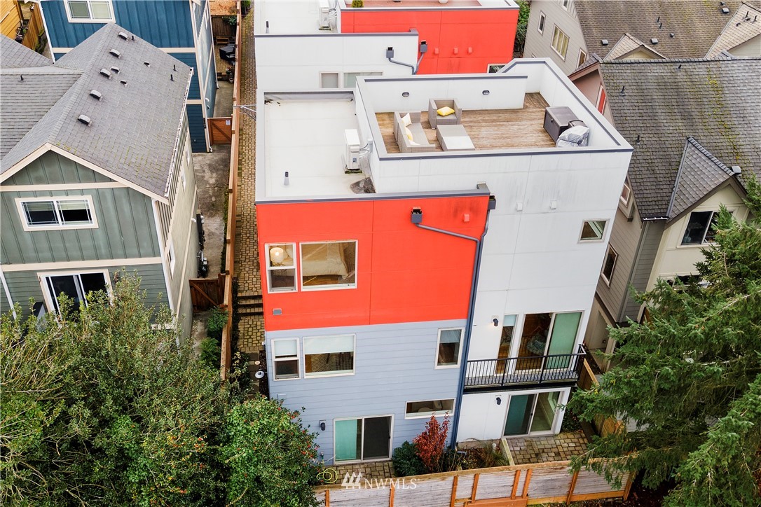 3932 South Brandon Street, Unit B Seattle, WA 98118 - Photo 29 of 29 an aerial view of residential houses with street