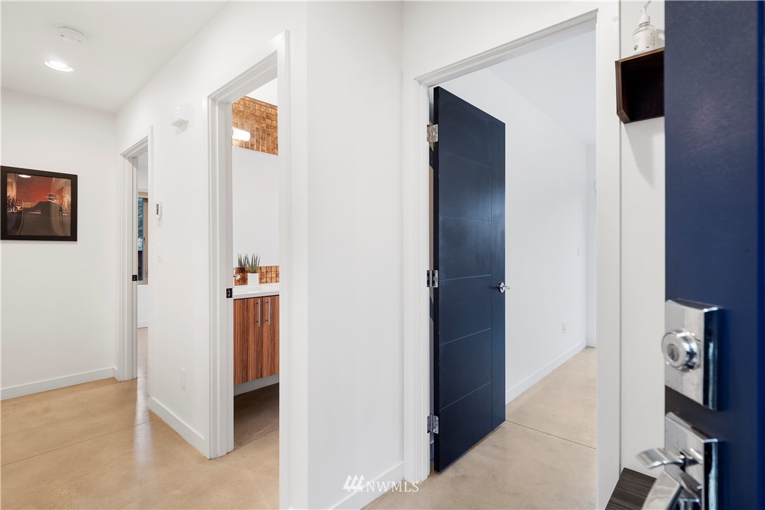 3932 South Brandon Street, Unit B Seattle, WA 98118 - Photo 3 of 29 a view of a hallway with elevator