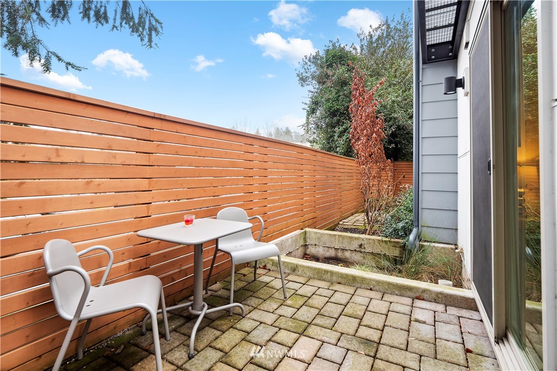 3932 South Brandon Street, Unit B Seattle, WA 98118 - Photo 10 of 29 a view of an outdoor space with seating