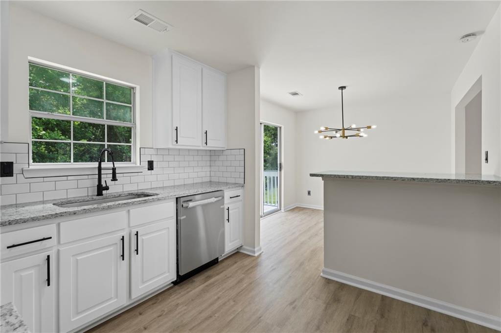 3602 Bristol Overlook Rex, GA 30273 - Photo 16 of 37 a kitchen with a sink cabinets and window