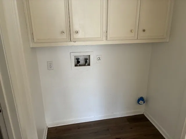 a view of door with cabinet