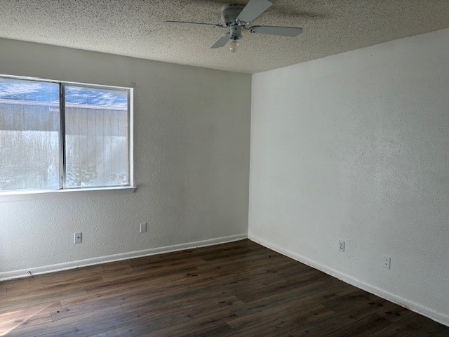 404 West Dittmar Road Austin, TX 78745 - Photo 15 of 15 an empty room with wooden floor and windows
